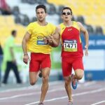 Gerard Descarrega junto a su guía Marcos Blanquiño a la final del 400 metros T11